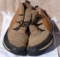 two shoes laced together